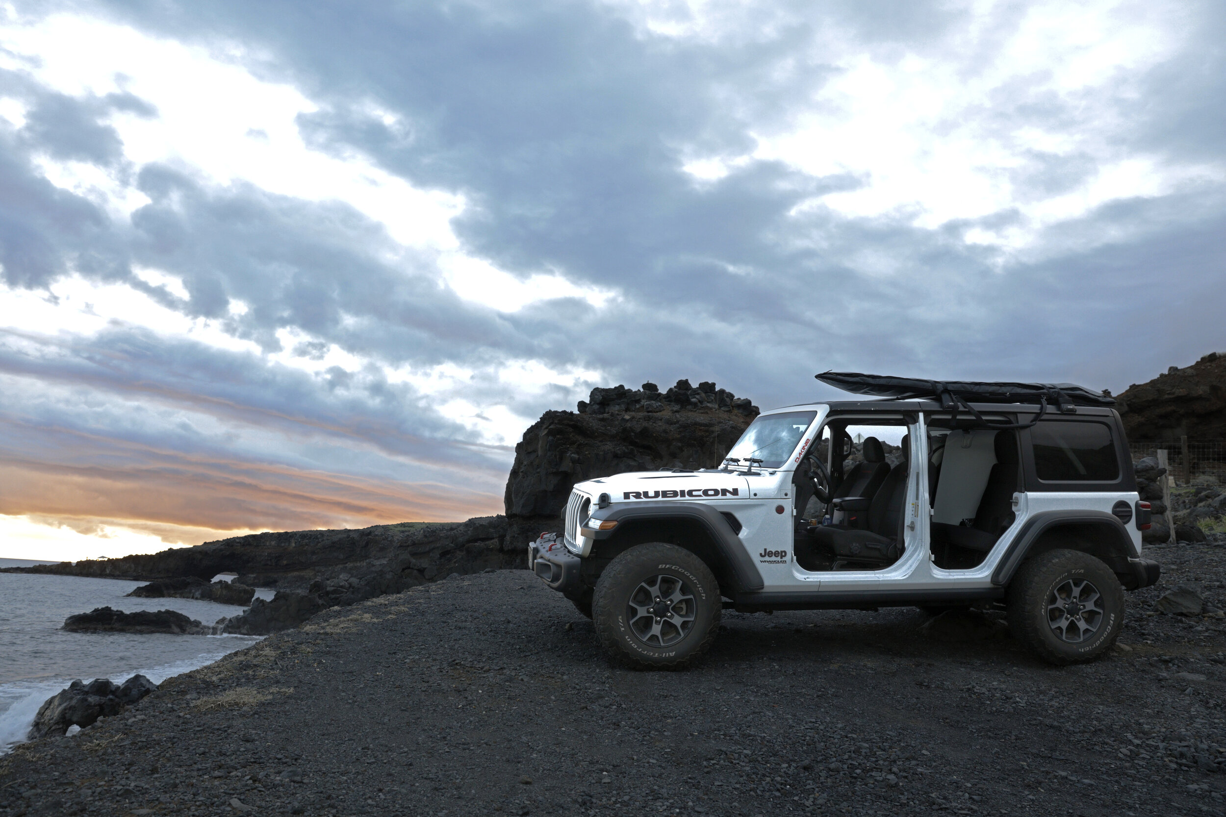 Luxury lifted hardtop Jeep Wrangler Rubicon convertible rental Maui Hawaii doors off ocean sunset.JPG