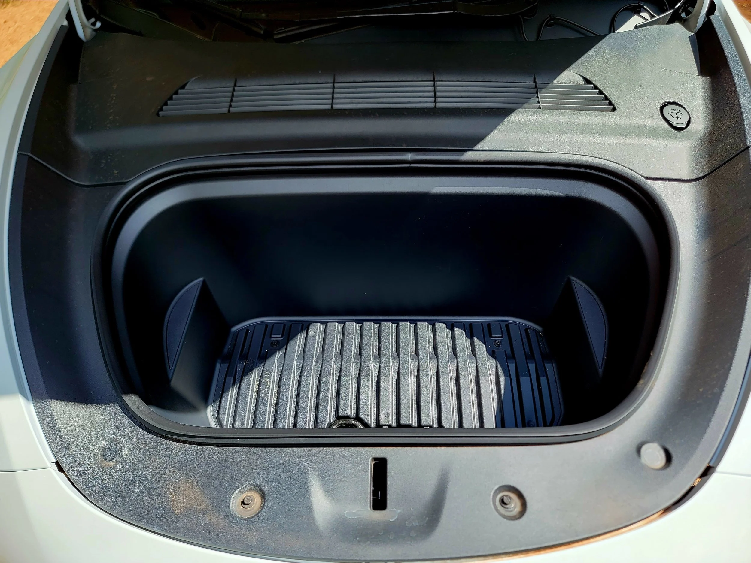 Luxury fully loaded electric Tesla Model Y mid size AWD SUV 4-door 4x4 rental Kahului OGG Maui airport Hawaii Seats 7 frunk.jpg