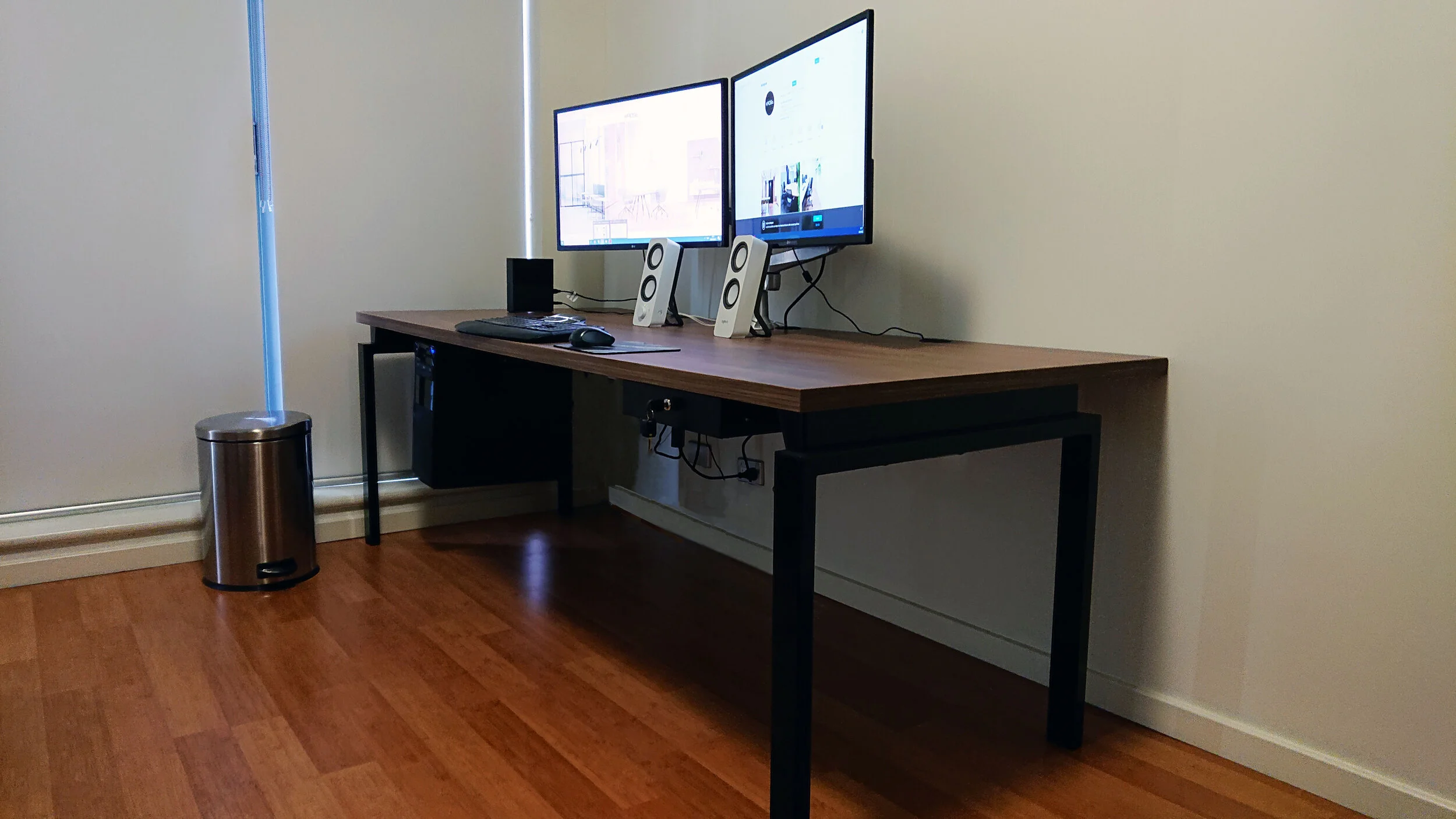 Featured: Benchwork Executive Desk, Logic Monitor Arm, Globe Under Desk drawer.