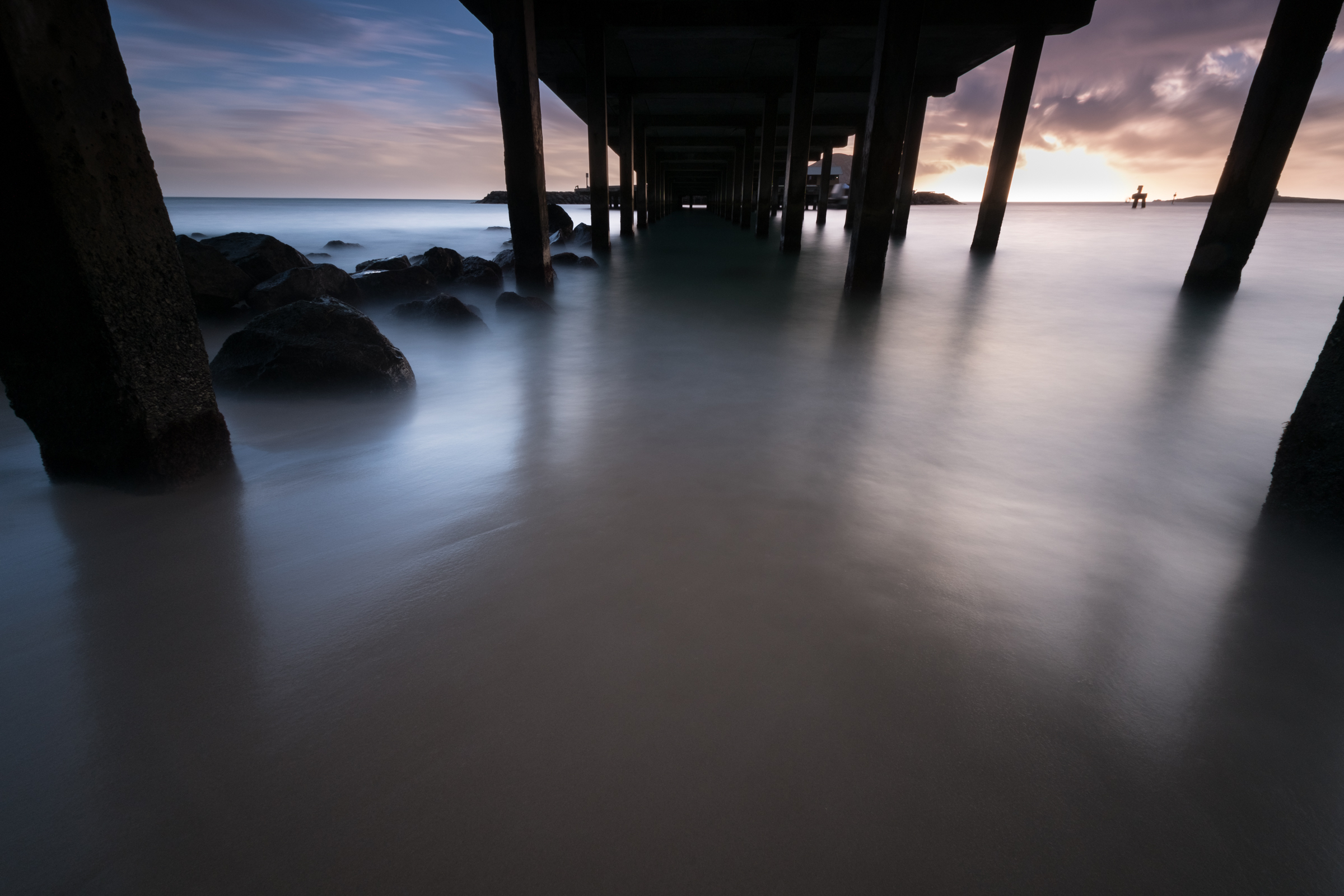 Sunrise at Makai Pier Oahu, Hawaii 07.04.16 6:34am Stacked Lee Big Stopper Fuji Xpro 2 | 60 sec. | f/11 | ISO 200 | Fujinon 10-24mm f/4 Edited in Lightroom CC 2015 Copyright 2016 Ryan Sakamoto, All rights reserved