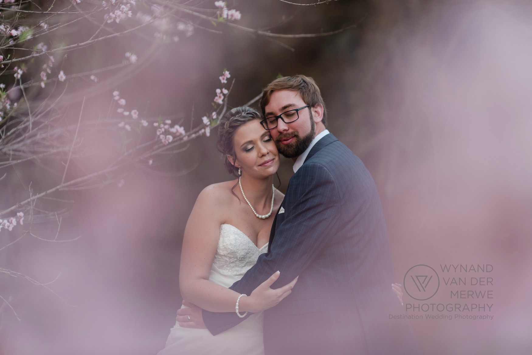 Beautiful wedding photo in blossoms