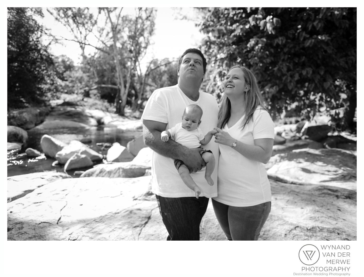 Family photography next to a river