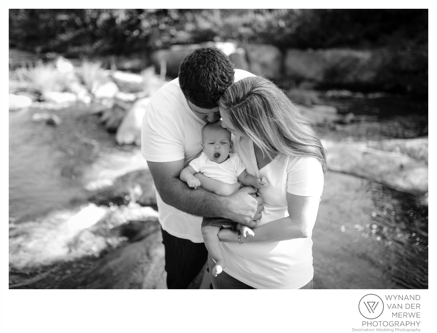 Family photography next to a river