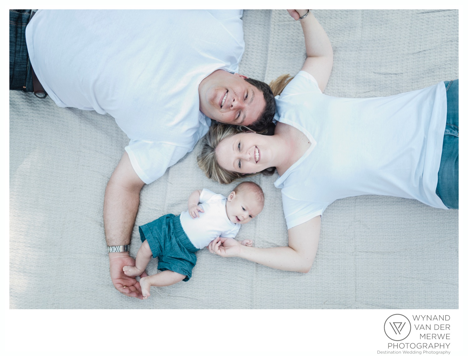 Family photography next to a river