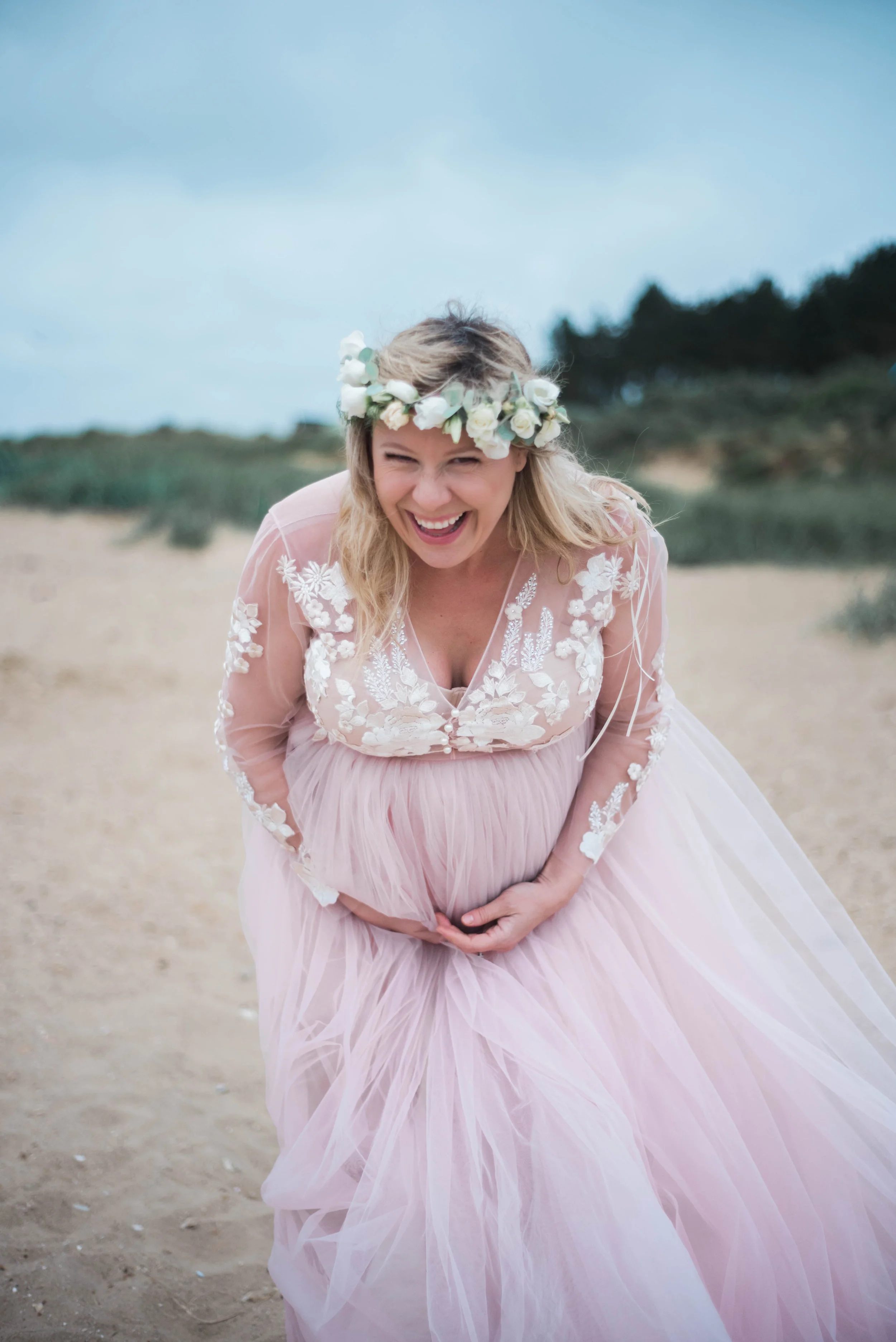 By the way...this is the essence of Danell, full of laughter and light wrapped in a tulle ballgown and topped with a flower crown.