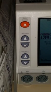 The volume buttons are usually on the left side of the machine. If you only have one baby - you need only mess with the top set :-) 
