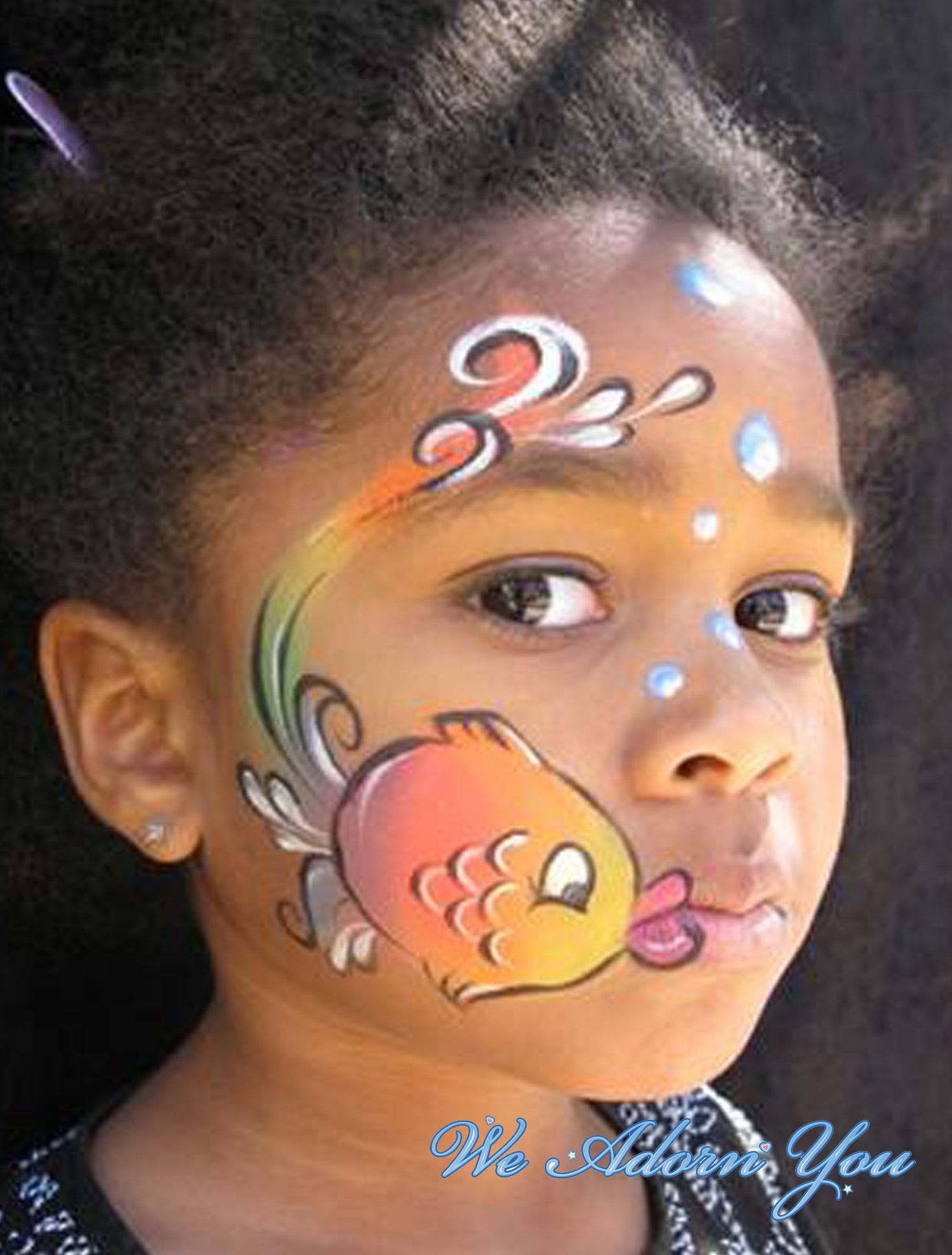 Face Painting Rainbow Fish- We Adorn You.jpg