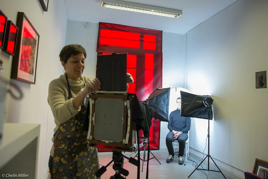 Almudena Romero making collodion plates at her studio in East London for her project "Growing Concerns" about immigrants to UK. With JC Candanedo (Grey Pistachio).