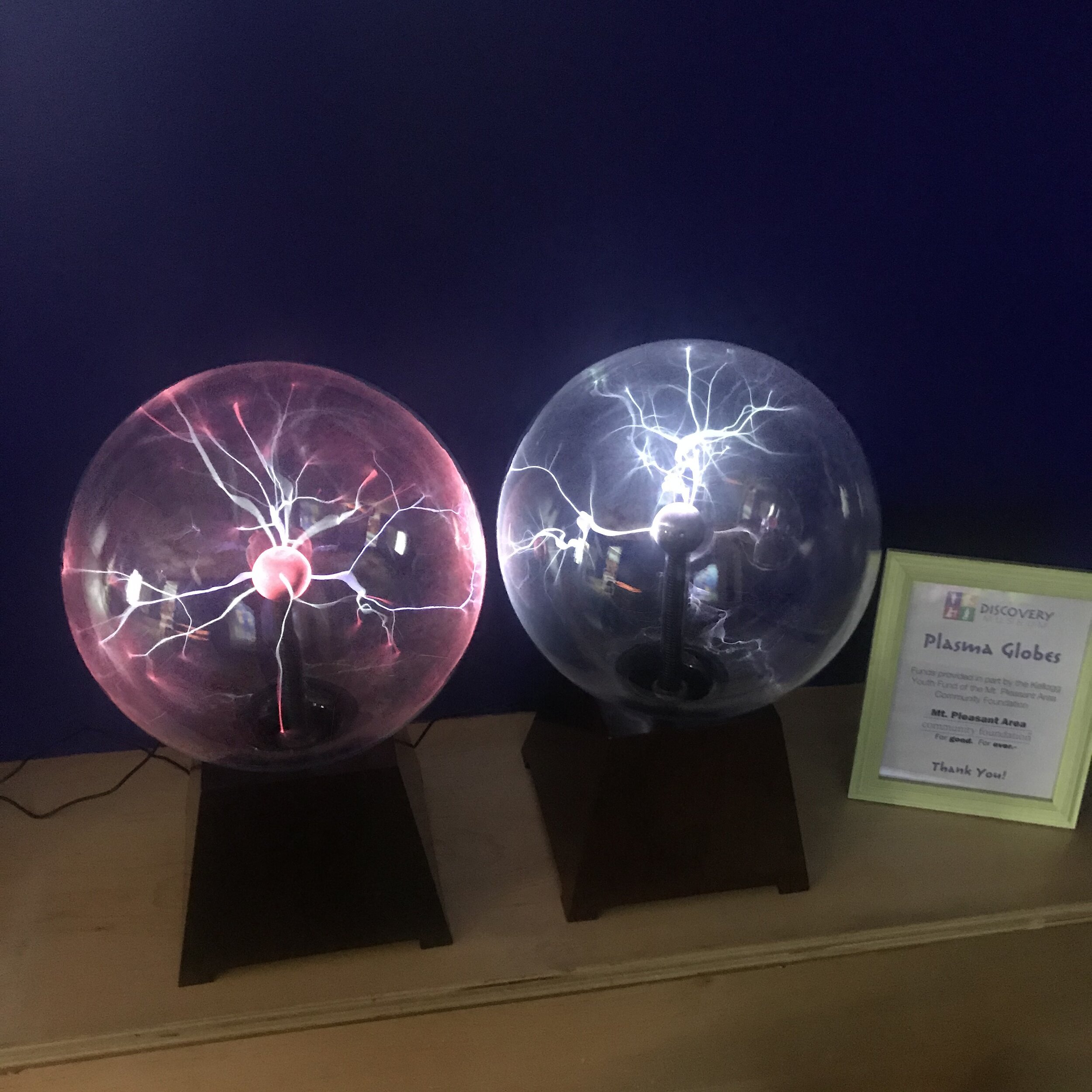 Pink and white plasma globes at the Mt. Pleasant Discovery Museum