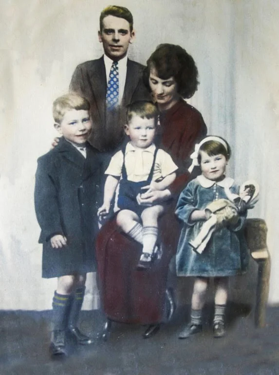 An image of George and his family taken in the 1930's