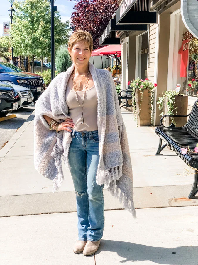 Cuddle Up in Our Cozy Sweaters and Wraps!