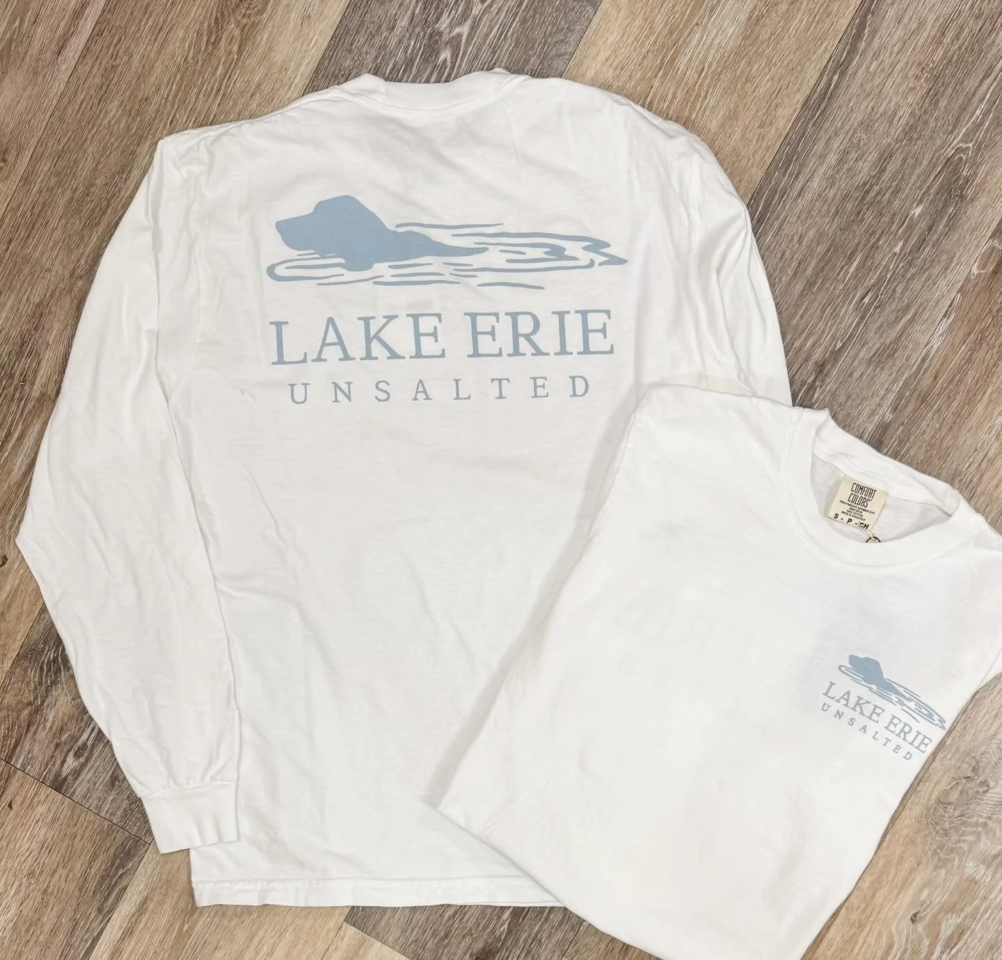 We&rsquo;re loving our new long sleeve t-shirts from @lakesidelocalsapparel 🐶 Perfect for water and dog enthusiasts or those who just love cozy tees!  Don't forget to grab one for yourself! 😊💕🐶