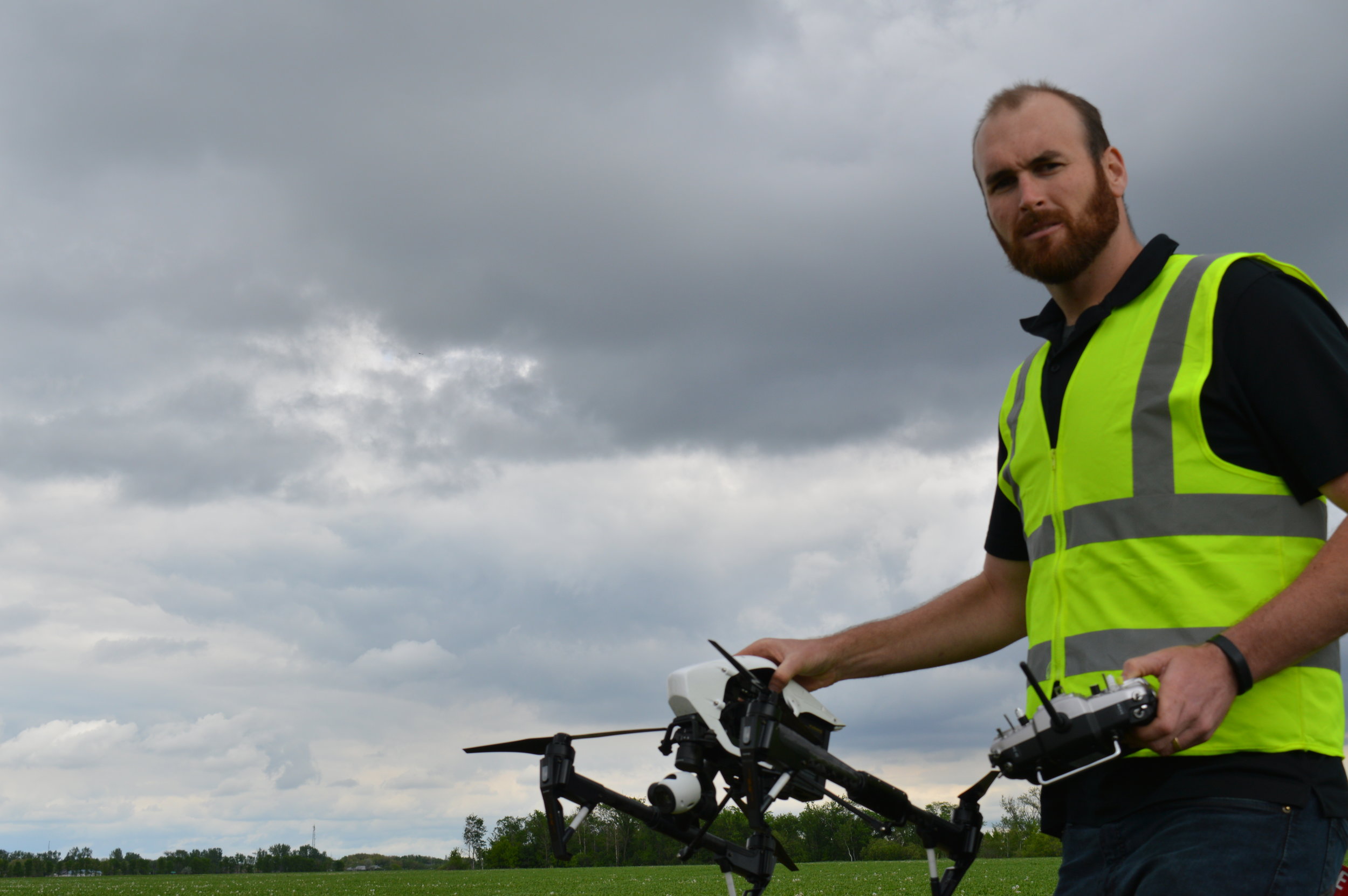 Matthew Johnson, owner of M3 Aerial getting ready to launch the DJI Inspire 1. You can gather NDVI when it is cloudy, but try to avoid collecting when there are spotty cloud cover that casts temporary shadows on the field during your flight...