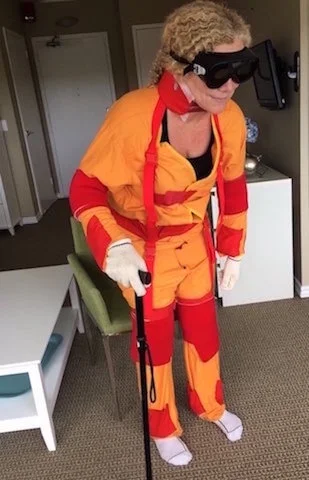 The aged-simulation suit adds about 30 years. Photo by Samantha Gary