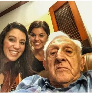 Myself and Christina with Papi a year before he passed, teaching him how to take a selfie!