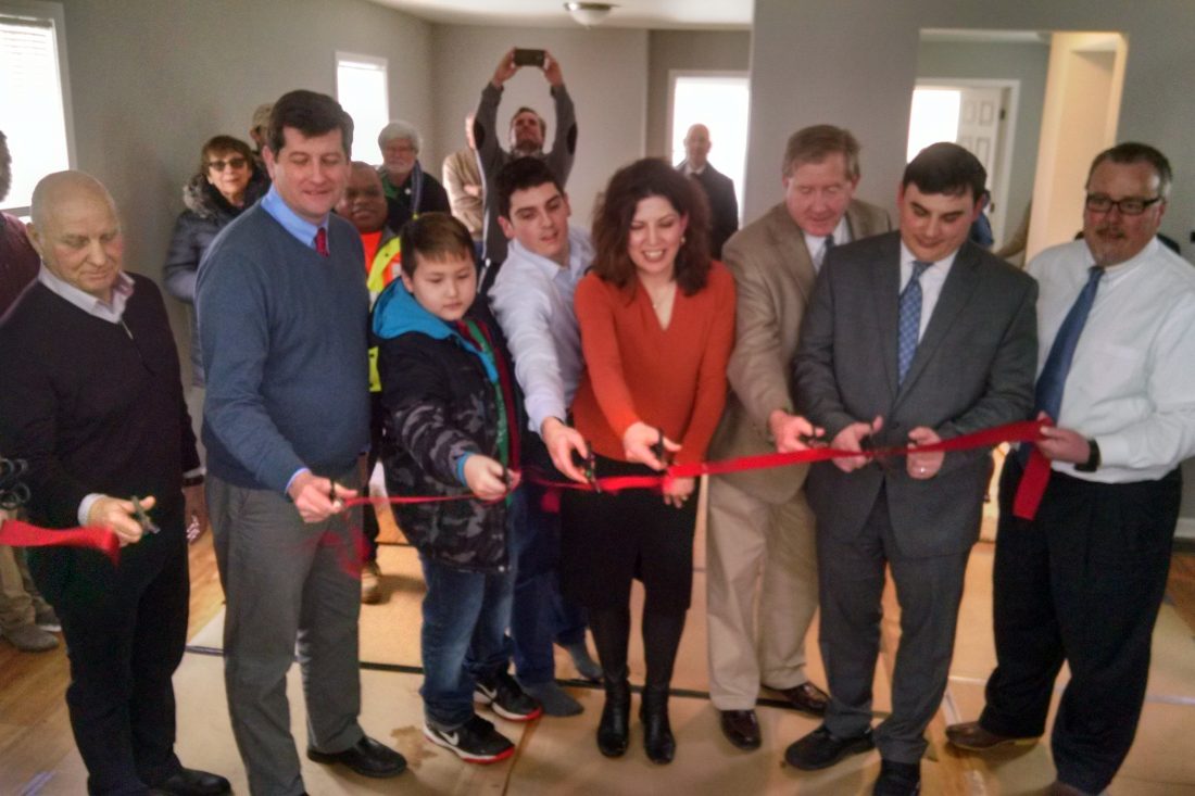 A formerly vacant house in the Village of Kenmore was rehabbed by the Buffalo Erie Niagara Land Improvement Corporation and will soon be sold. Officials marked the completion of the project Tuesday with a ribbon cutting. Photo from buffalonews.com March 14, 2017.