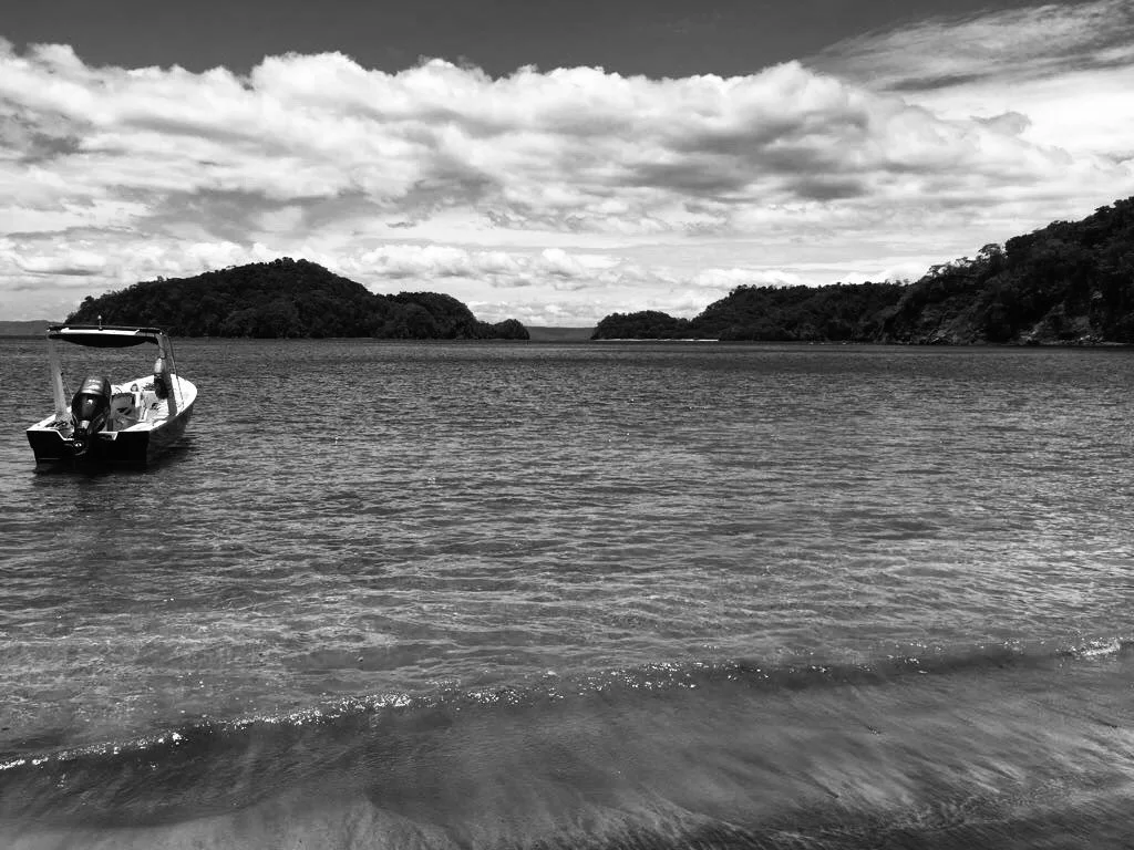  Black and White photo of boat in Costa Rica 