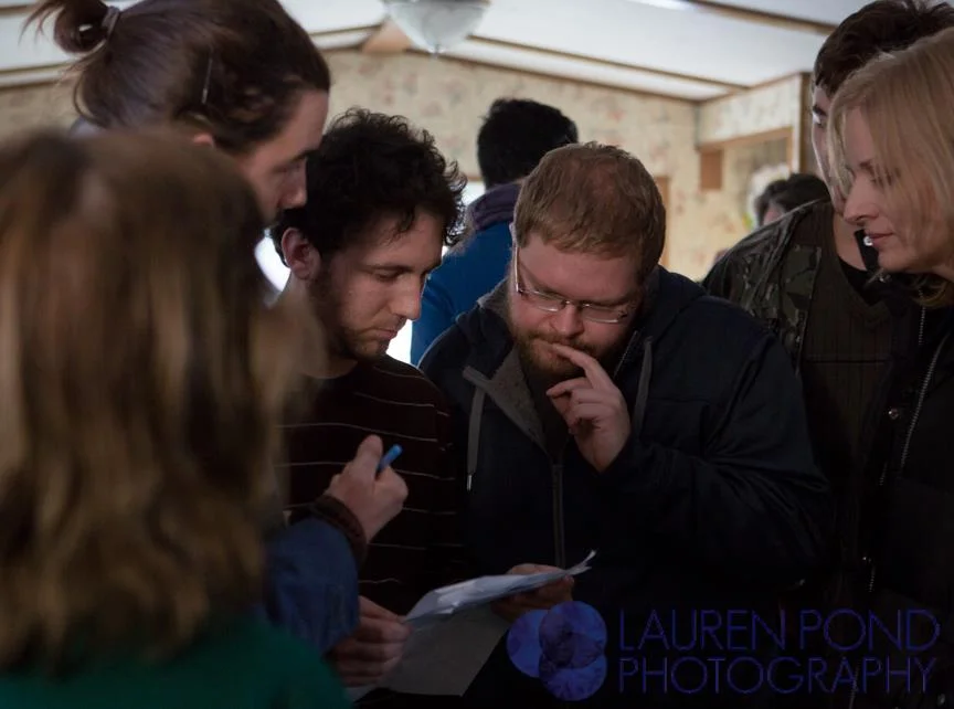 Crew pow-wow before lunch. From Left to Right: Production Designer Tessa McCall, 1st AD Luke Szabados, Cinematographer Michael Greene, Director Cory Pratt, Actors Anthony Baldasare and Kristina Kopf