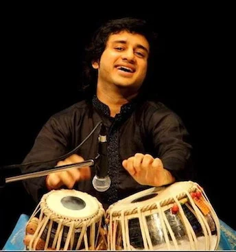 Mumbai-based tabla virtuoso Aditya Kalyanpur tours the world playing with the top level of Indian classical musicians. He was a child prodigy, studying tabla with the highest masters Alla Rakha and Zakir Hussain, and has worked with greats like A.R. Rahman (Slumdog Millionaire), Pandit Shivkumar Sharma, Shankar Mahadevan, Pandit Jasrajji, Larry Coryell, George Brooks, Kenwood Denard, as well as pop and rock artists from Katy Perry to Keith Richards. He founded the New England School Of Music in Boston along with the Shyamal Music Foundation in Mumbai.