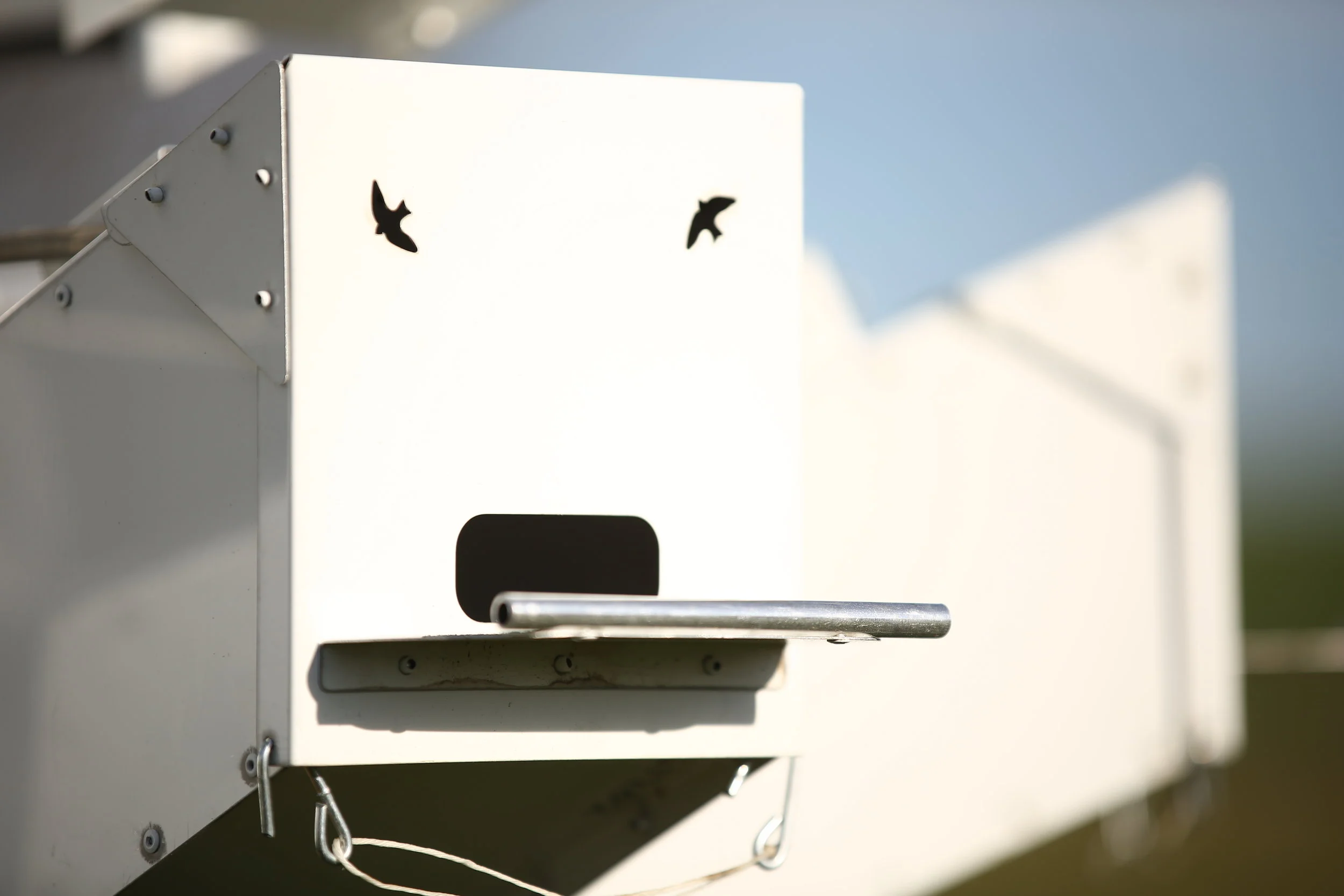  The martins on the front panel are actually cut outs that act as ventilation holes for the box and in conjunction with the discharge opening at the bottom back of the compartment a ventilation system in formed. &nbsp; 