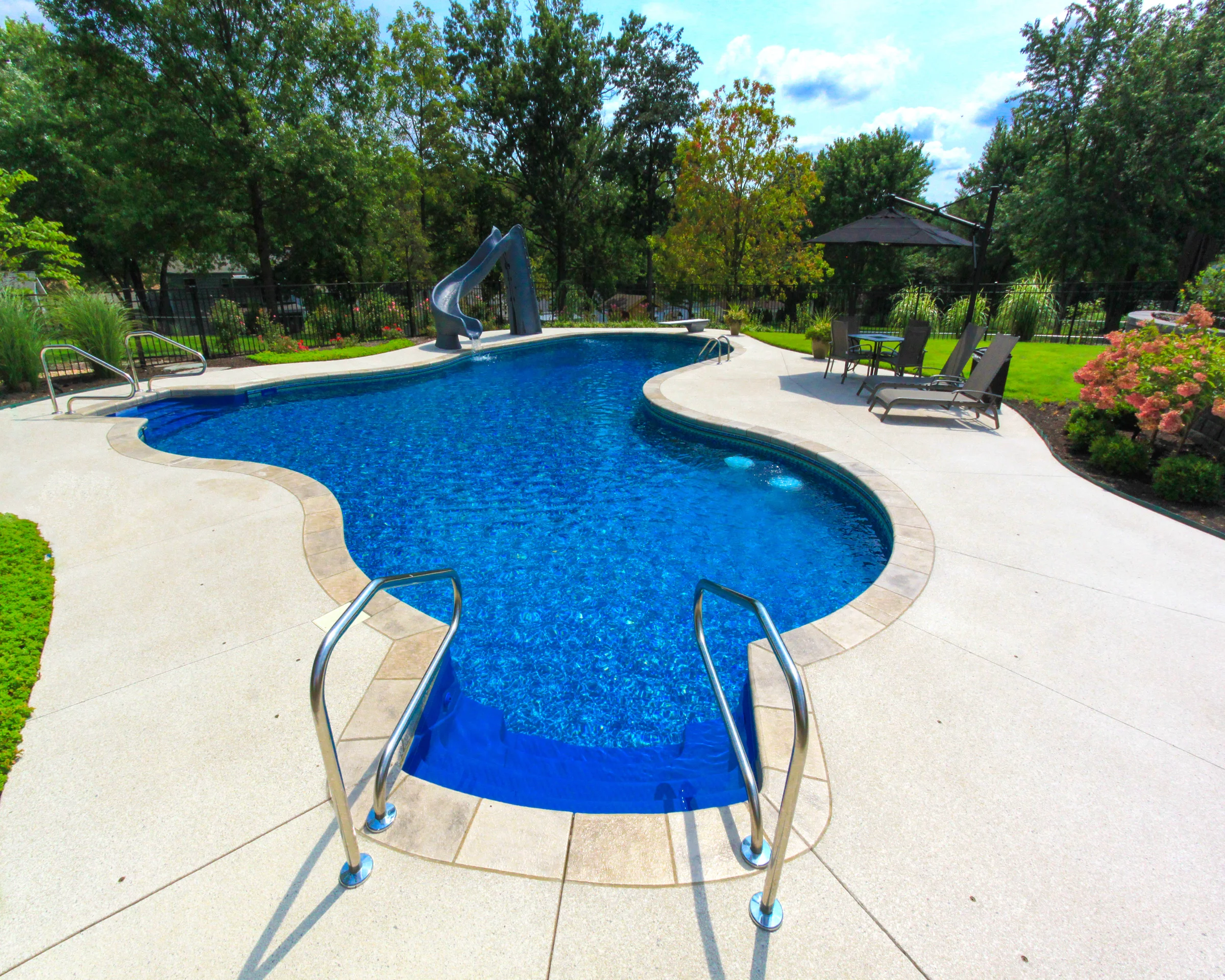 61 | Custom Lagoon. Dual Walk In Steps, Slide, Diving Board