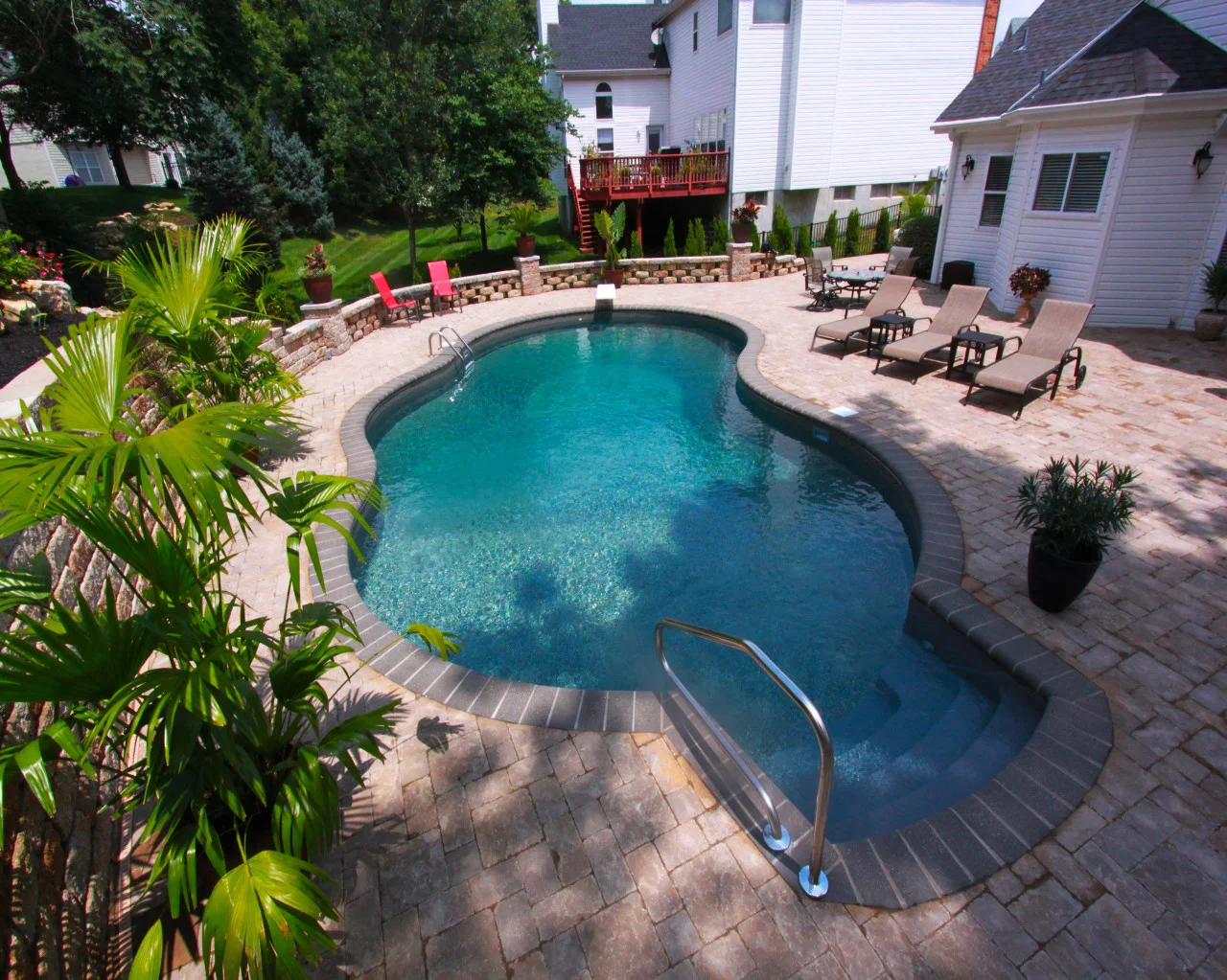 49 | Custom Gemini. Paver Patio, Versa Loc Wall