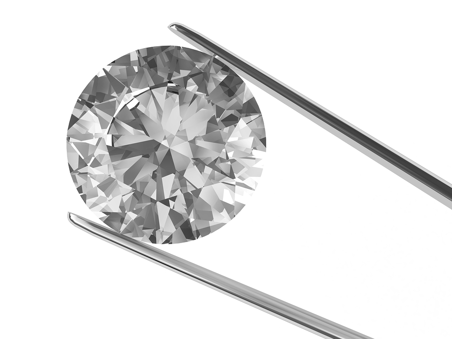 bigstock-A-Diamond-Held-In-Tweezers-3512536.jpg