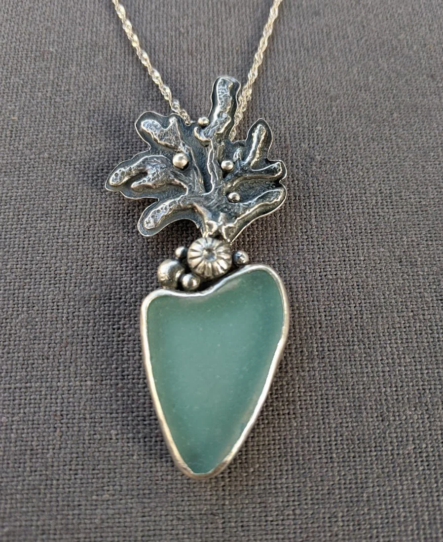 π Get ready to be showered in compliments when you treat yourself to a piece (or two!) from @love.mom.designs at this year’s Santa Barbara Sea Glass & Ocean Arts Festival! πβ¨
Jeweler Kristi Aitken crafts stunning wearable art using sea g