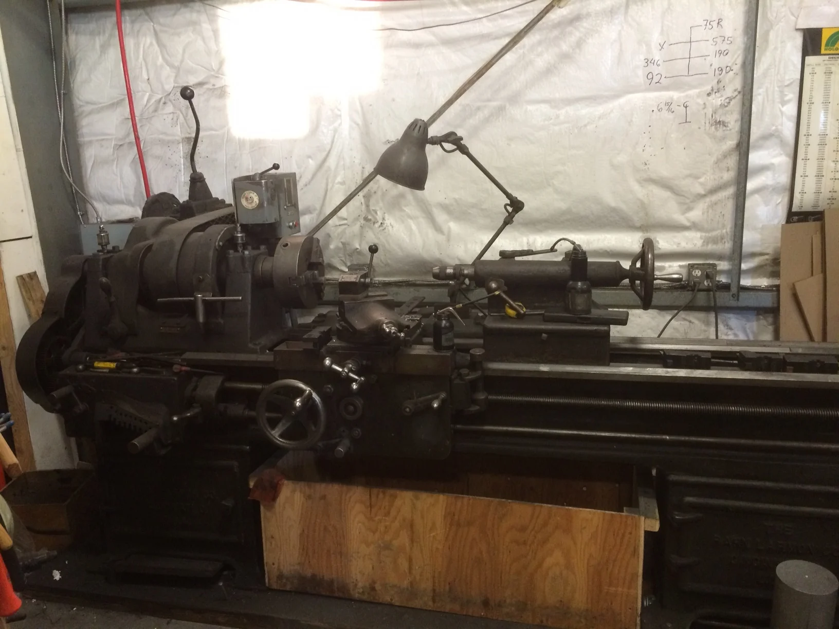 This lathe is a classic. Made by Rahn Larmon sometime between 1911 and 1941. It used to be powered by a flat overhead belt but someone along the line added an electric motor and 3 speed transmission from a truck for variable speeds. you can see the stick shift in the upper left corner. It was previously owned by Wards Cove Packing, a seafood processor and before that by Libby McNeil Libby, which is still around as Libby's which processes canned fruit.