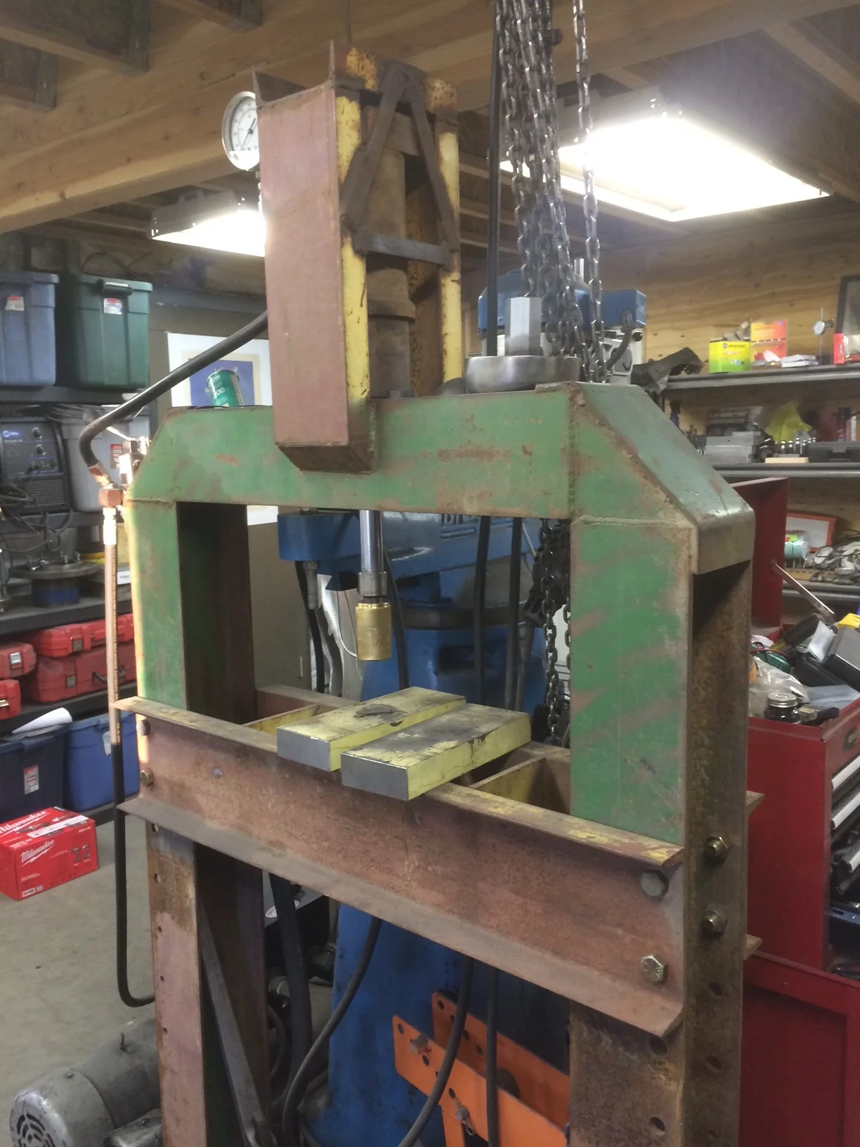 This is my little press that came from Metal Magic. It will push about 34,000 pounds which isn't a ton (well I guess its literally several tons) by press standards, but it works for most of my needs. Somewhat sadly, I can speak from experience that it is overkill for tenderizing chicken.