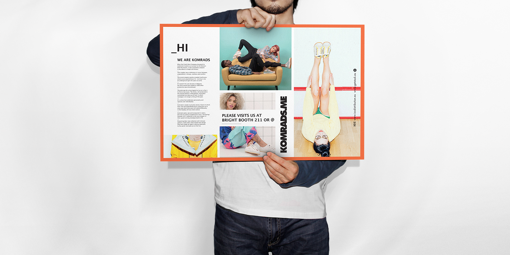 man_holding_paper_mockup.png