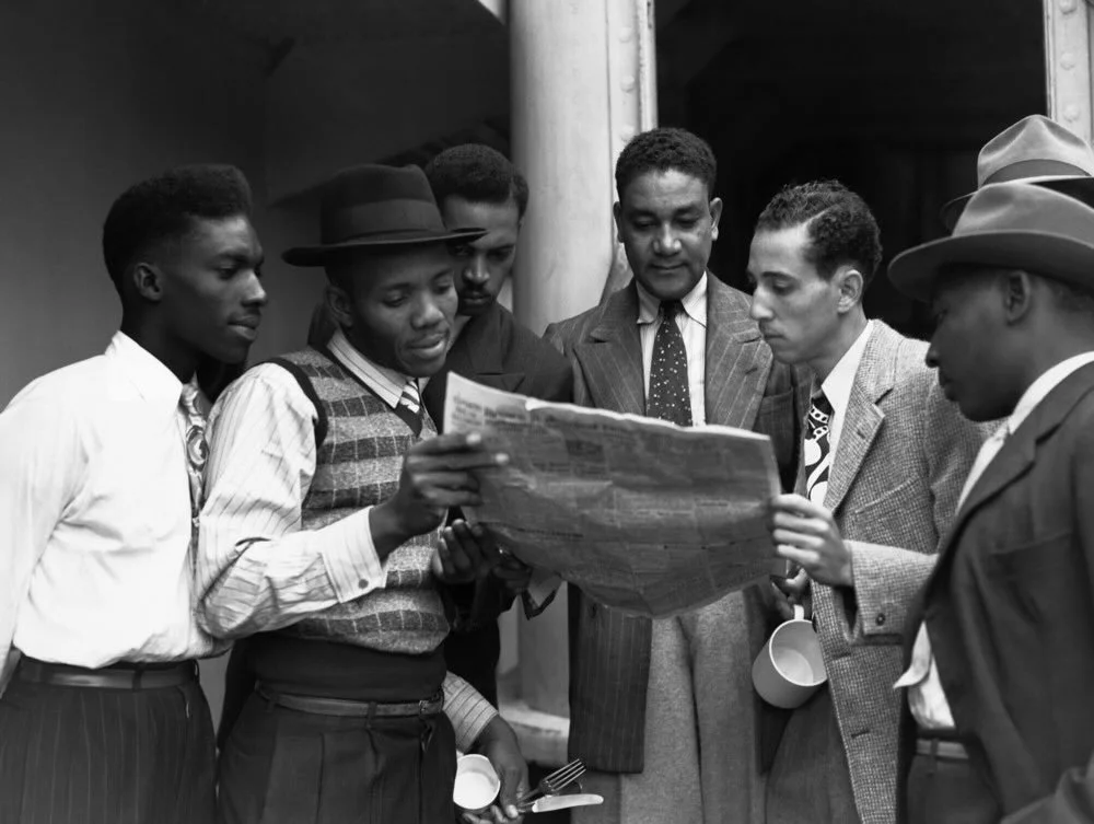 Windrush Day &lsquo;26!

It would seem I am now old enough to have had a grandfather who came from Jamaica to England on The Empire Windrush - 78 years ago today!! What!?! 

There he is, in his sharp suit on the right, looking fly, holding the newspa