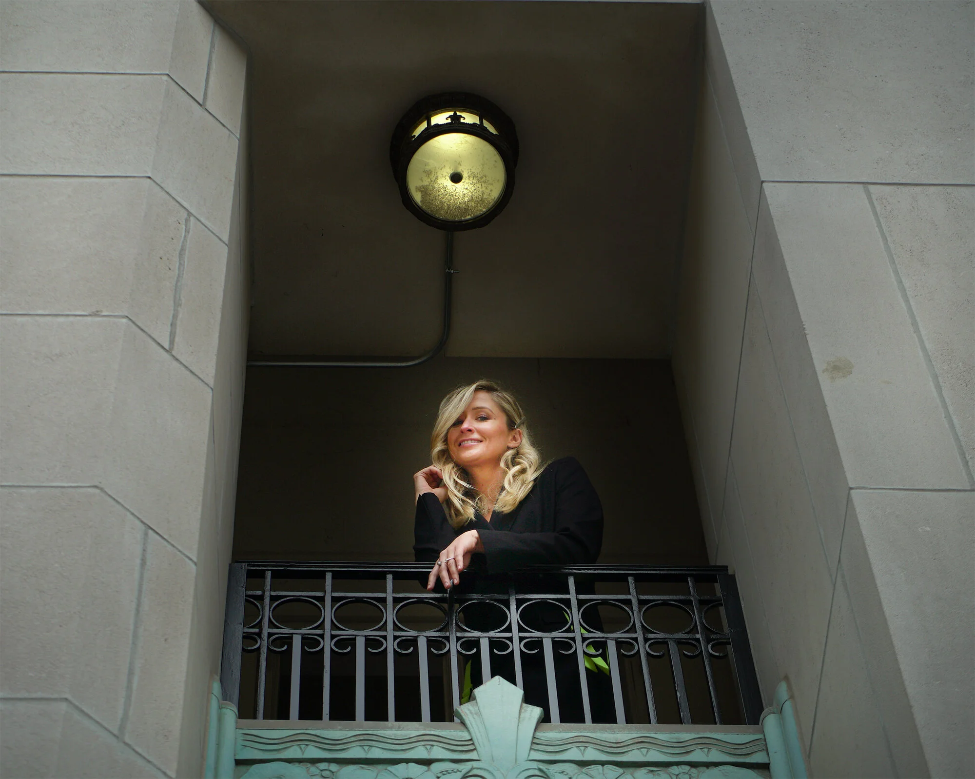 Courtney-Tharpe-on-balcony-at-The-Last-Hotel-in-St.-Louis - Copy.jpg