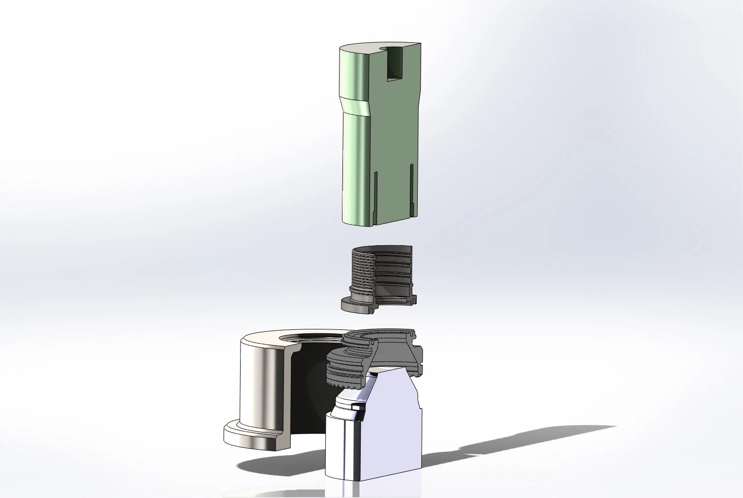 Parts are placed on the mandrel and locked in with a sleeve. The vibratrode imparts a circa 0.8 second charge at a precise frequency to weld the components together. Welds on even the smallest components withstood a 235 tonne pull test.