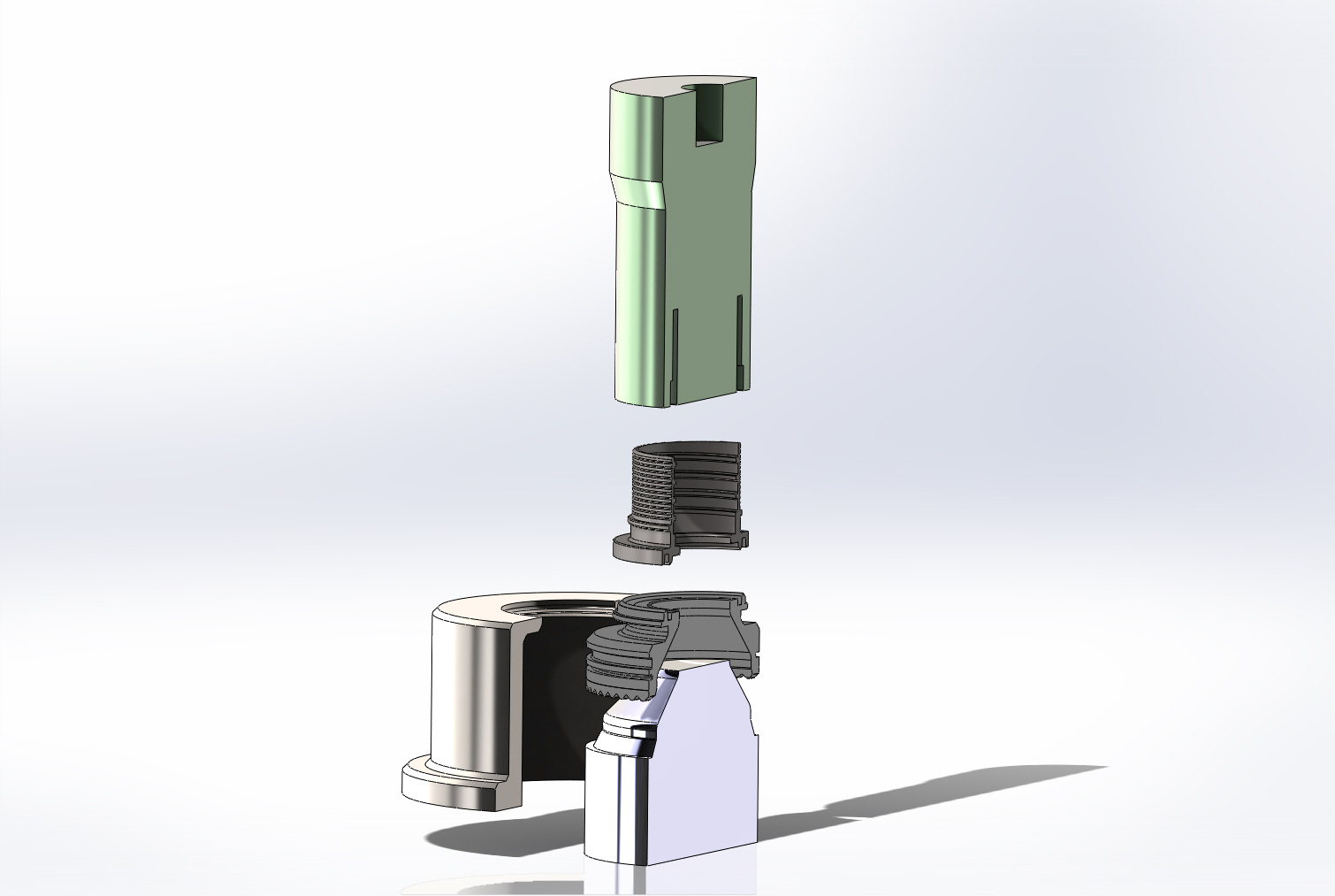 Parts are placed on the mandrel and locked in with a sleeve. The vibratrode imparts a circa 0.8 second charge at a precise frequency to weld the components together. Welds on even the smallest components withstood a 235 tonne pull test.
