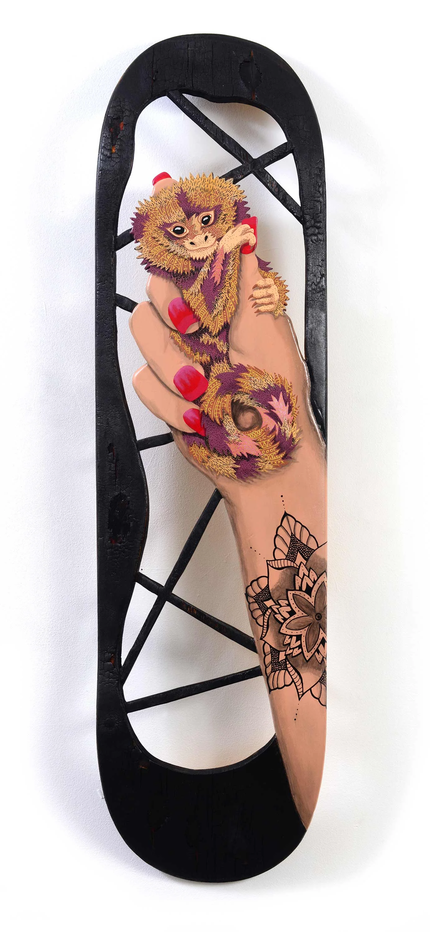  Ouistiti  Acrylic painting and Poscas on a burned skateboard.   21X80 cm. 02/2019. OUT 
