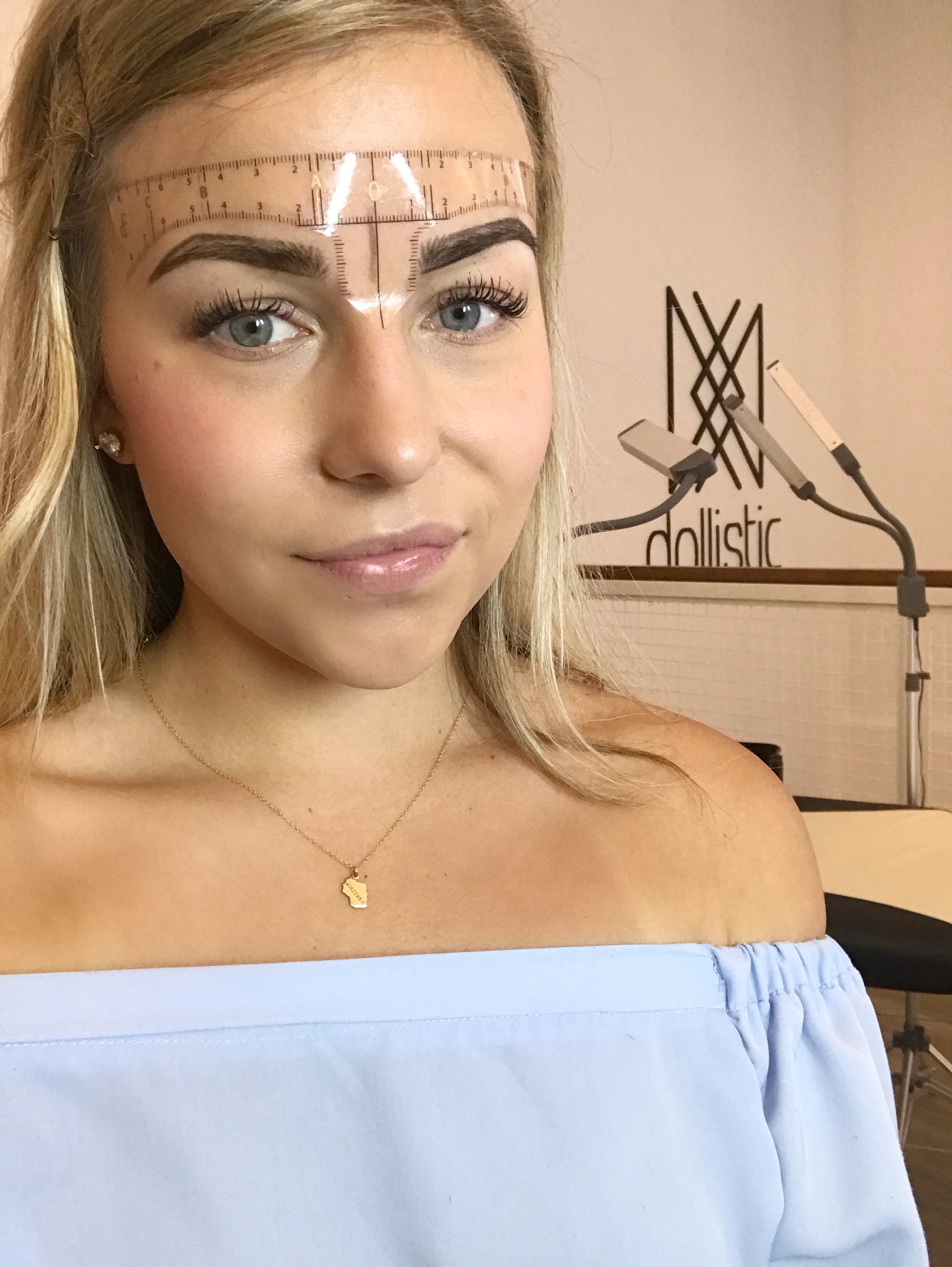 After applying the numbing cream, Christina filled in my brows and made sure they were symmetrical