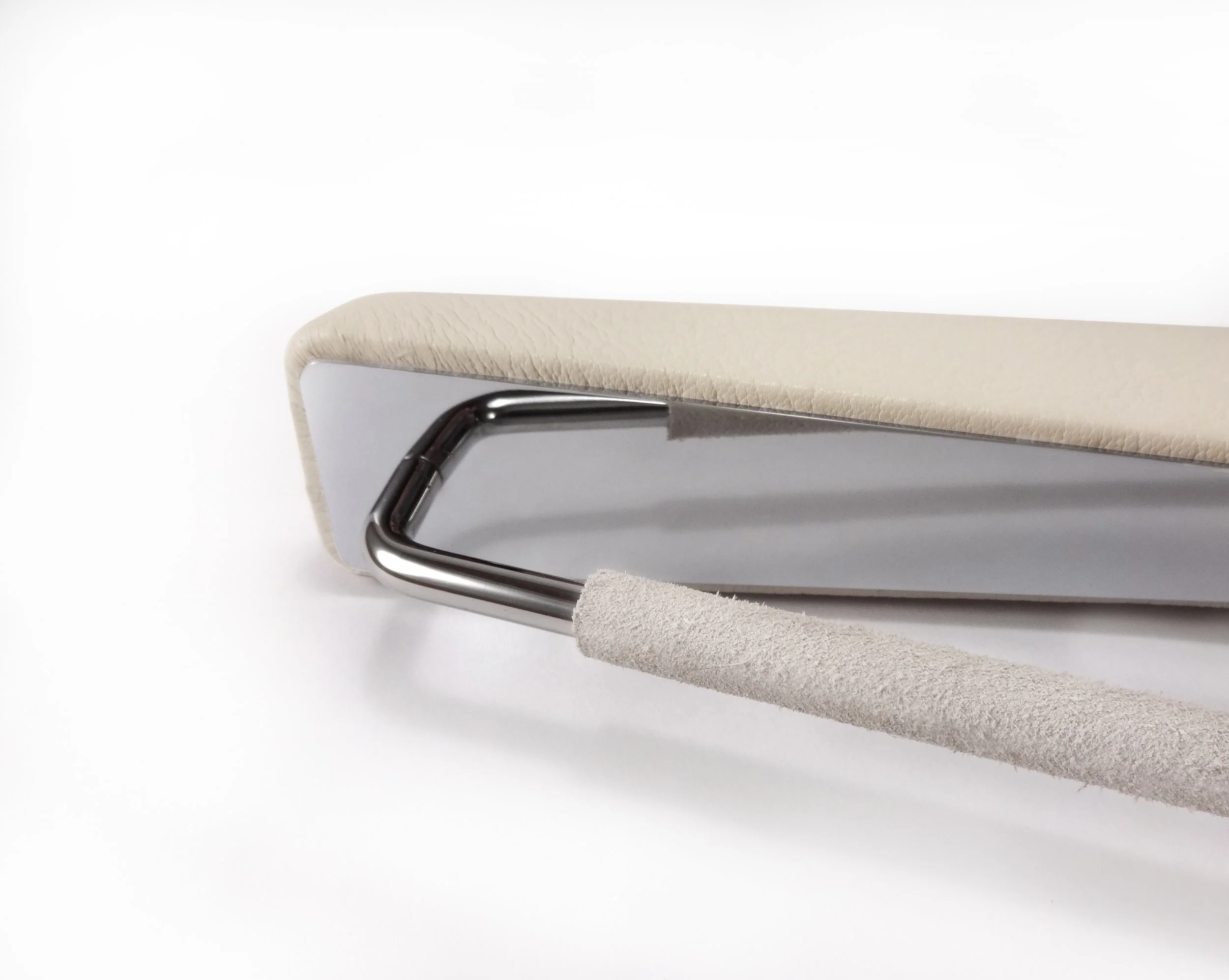 white leather hangers underside bar.jpg