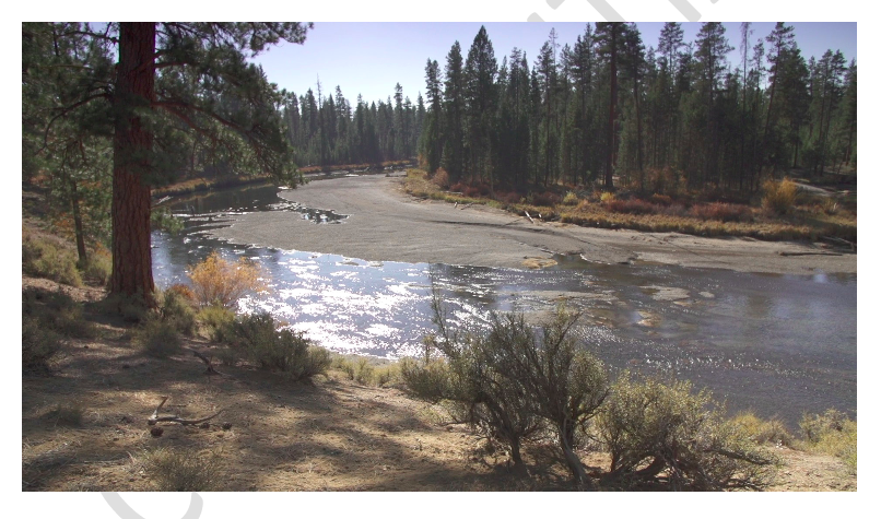 The river in the same location as the first picture, showing dramatic changes in water levels