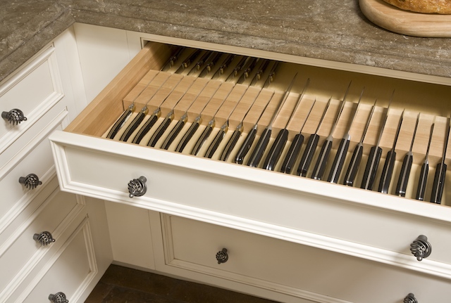 Special ingredient: Keep your kitchen feng shui and your knives sharp with a pull out knife holder from William Sonoma or custom made by a cabinet maker.