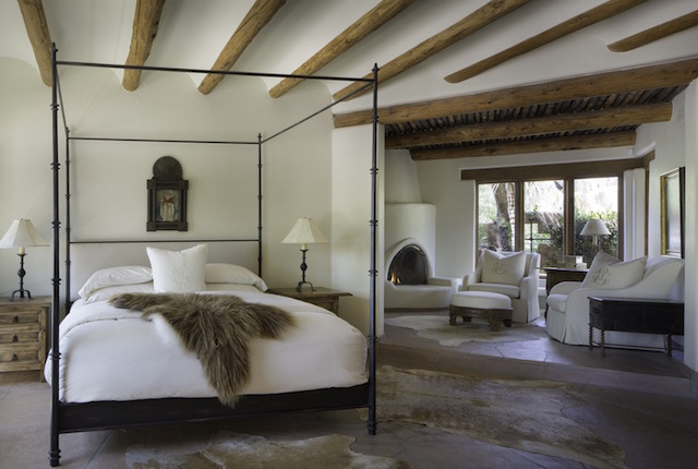 In this historically accurate hacienda bedroom, our client purchased great Mongolian fur throws and cowhide throws to make for a natural surrounding, similar hides can be found at Cowhide International . 