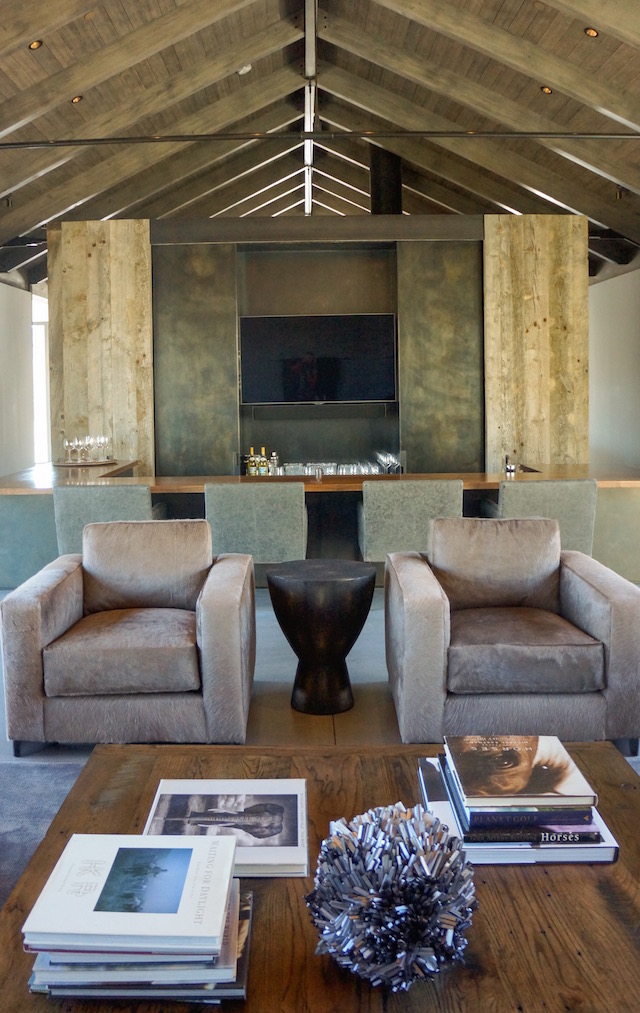 Using warm neutrals to complement the outside mountain surrounding these custom made chairs use Kyle Bunting cowhide to make a subtle statement of luxury. 