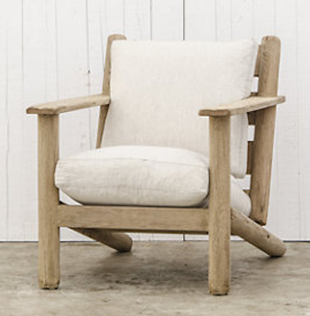 We also love Ralph Lauren ’s Post and Lintel Chair and Ottoman in white shearling. Really beautifully simple.