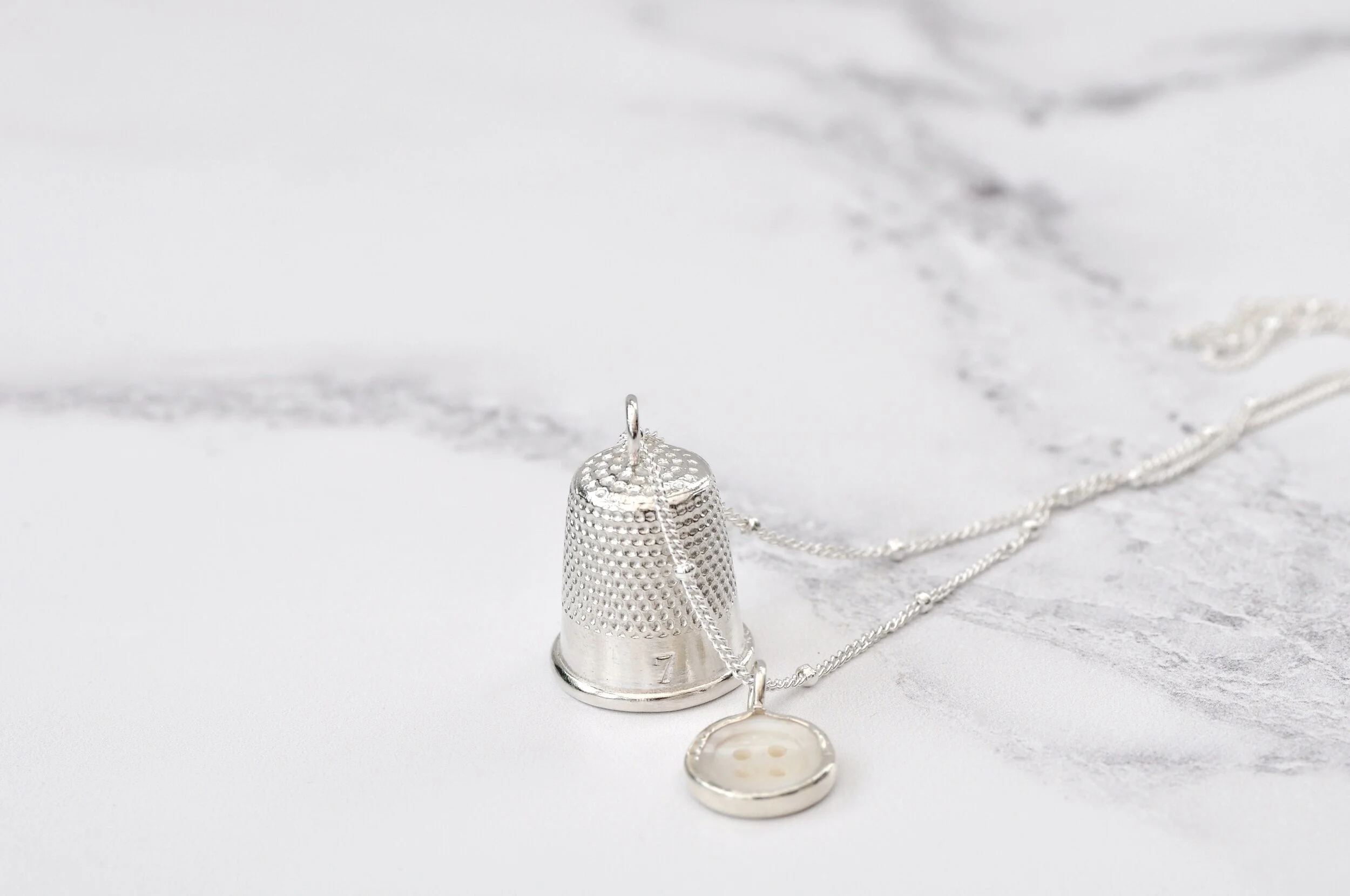 Small thimble and button 