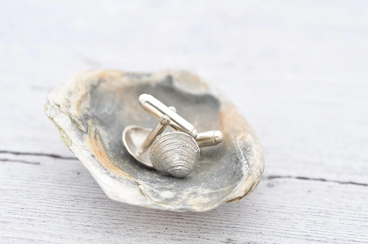Clam shell cufflinks.1500.jpg