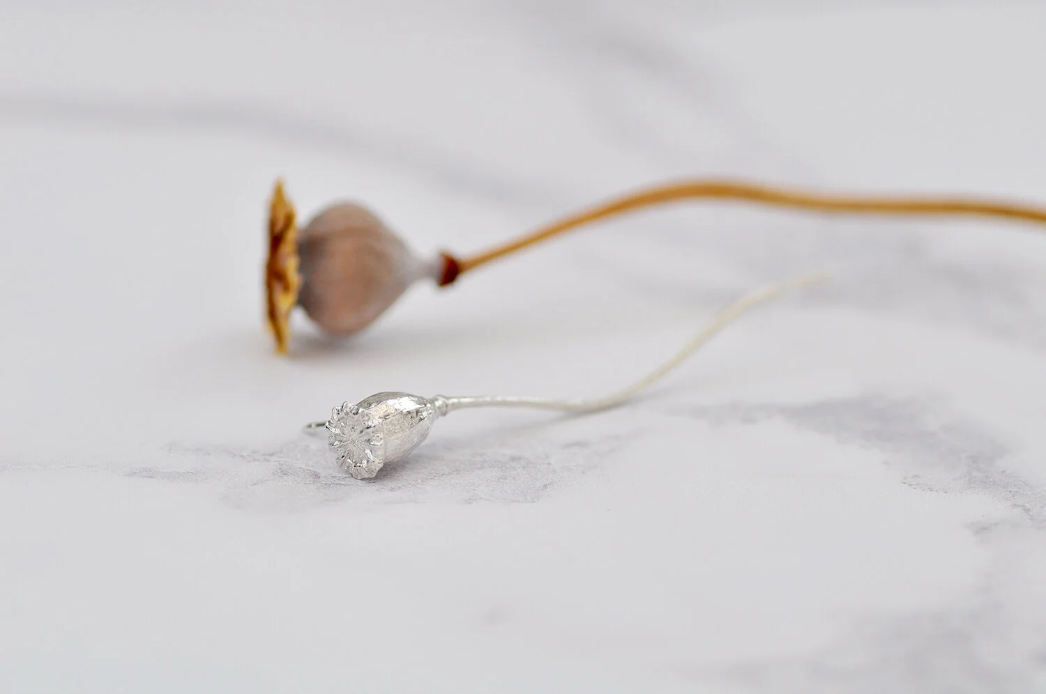 Poppy seed head lapel pin.4.jpg