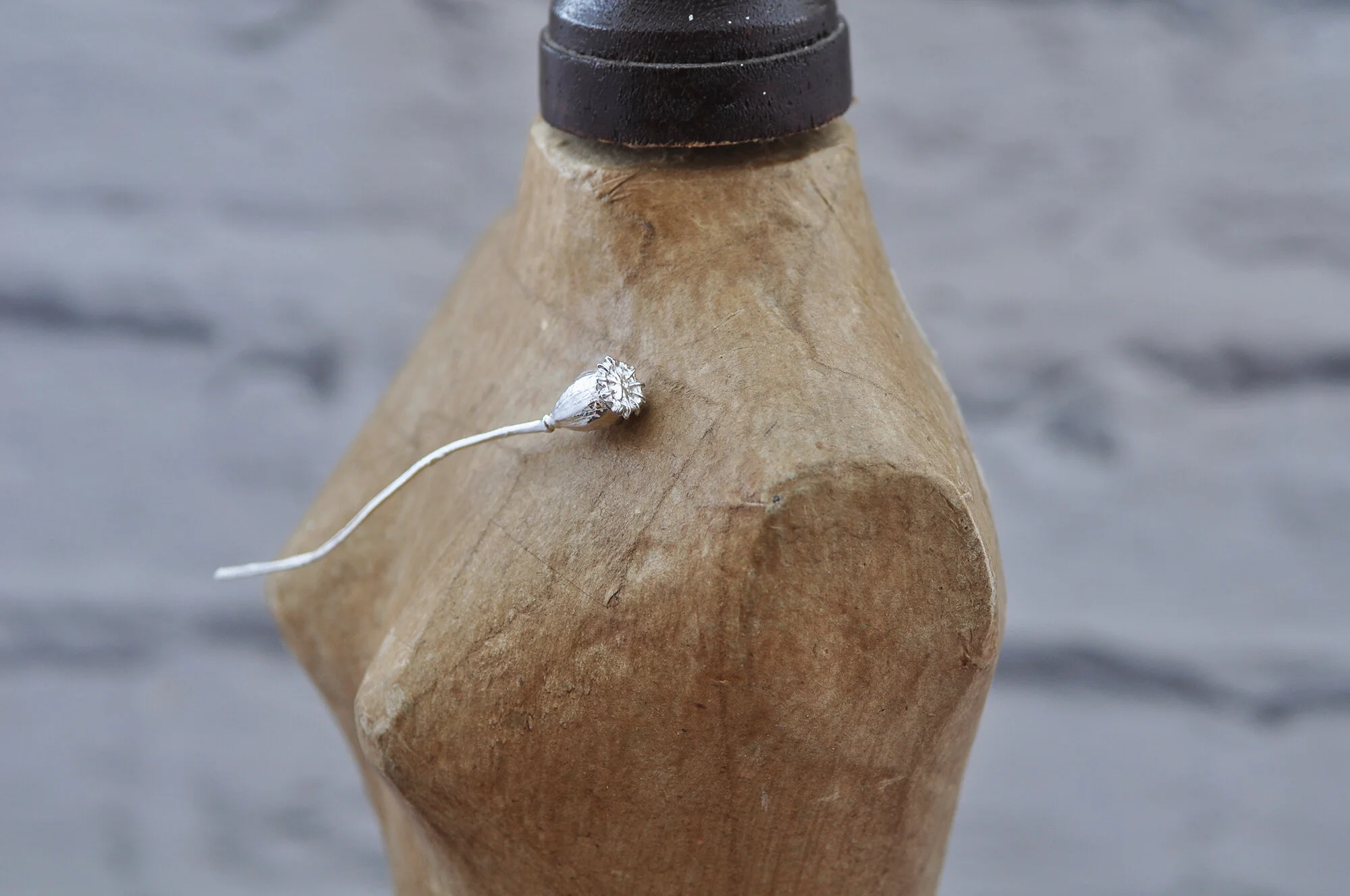 Poppy seed head lapel pin.2.jpg