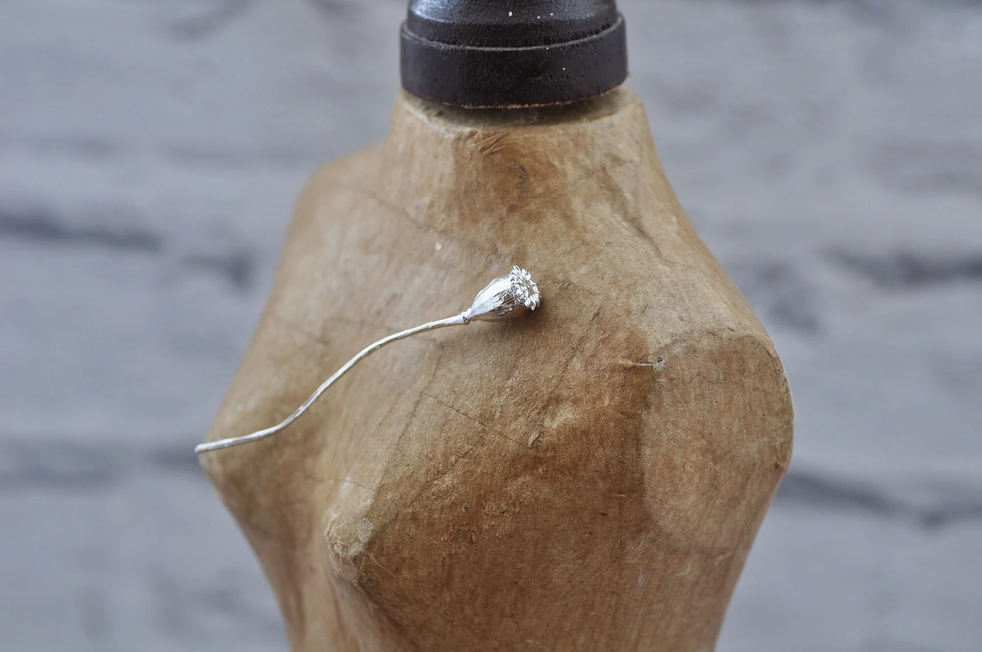 Poppy seed head lapel pin.1.jpg