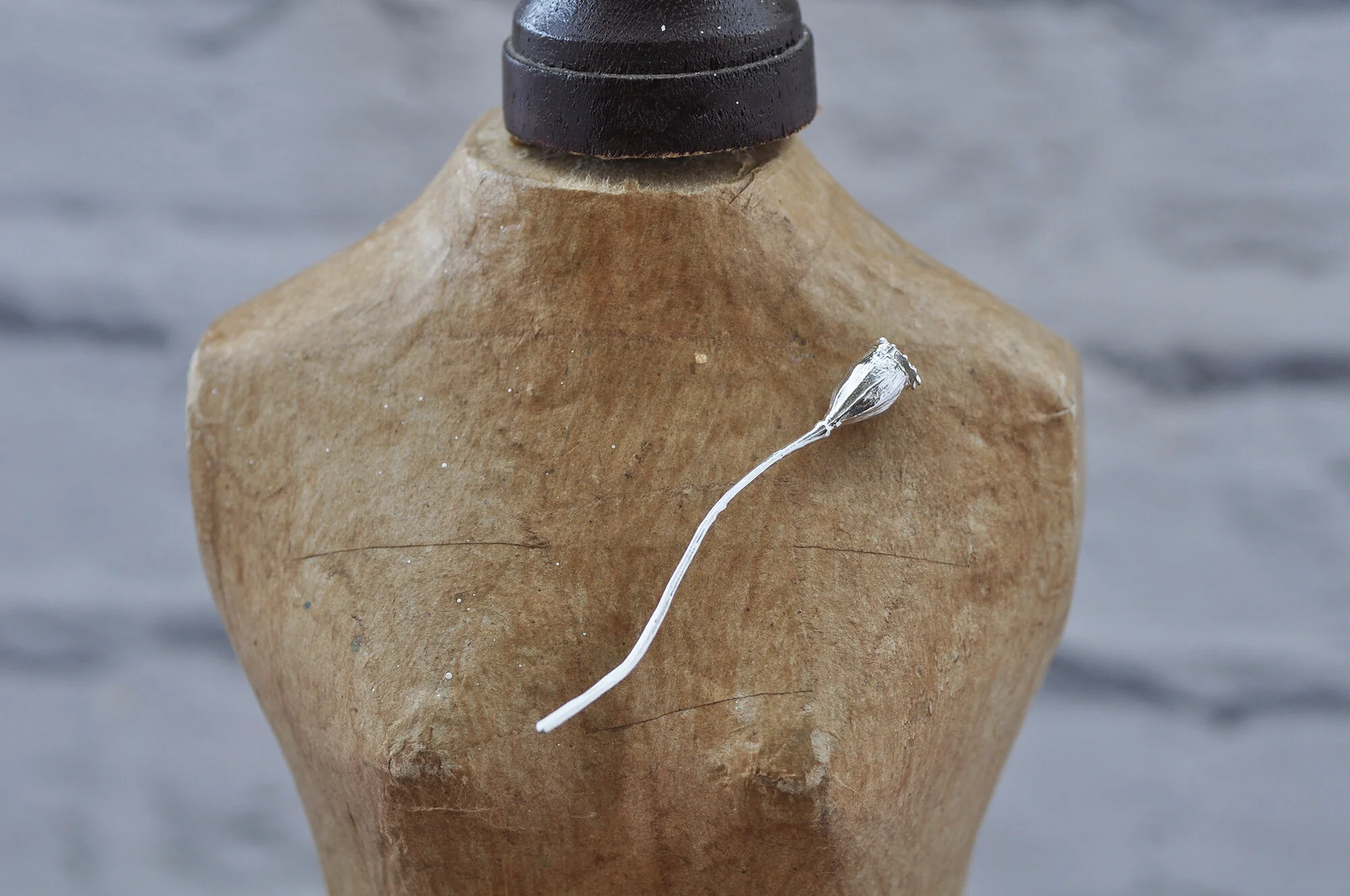 Poppy seed head lapel pin.jpg