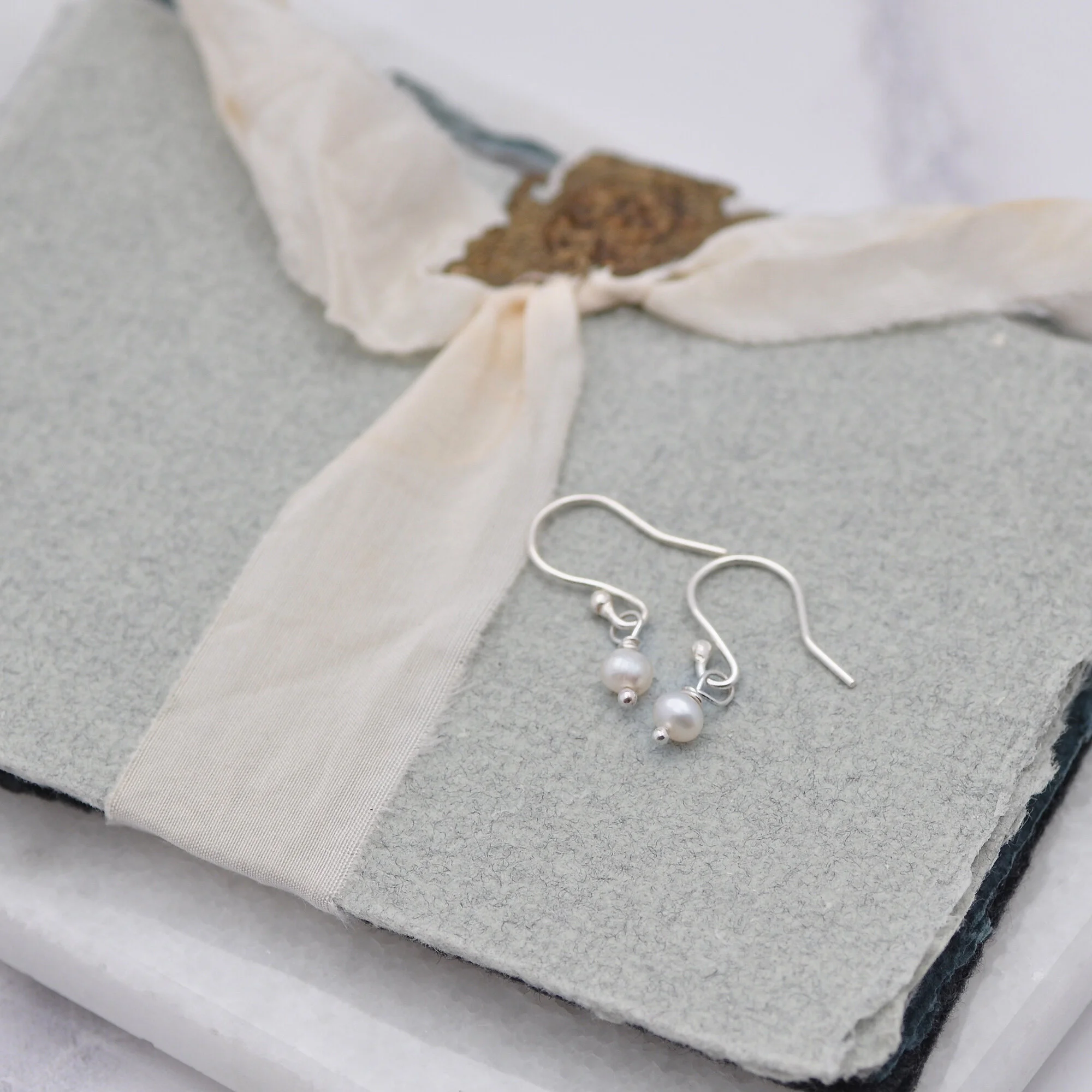 Wire-wrapped freshwater pearls.jpg